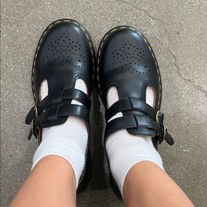 Dr. Martens Black Leather Mary Janes with Yellow Accents